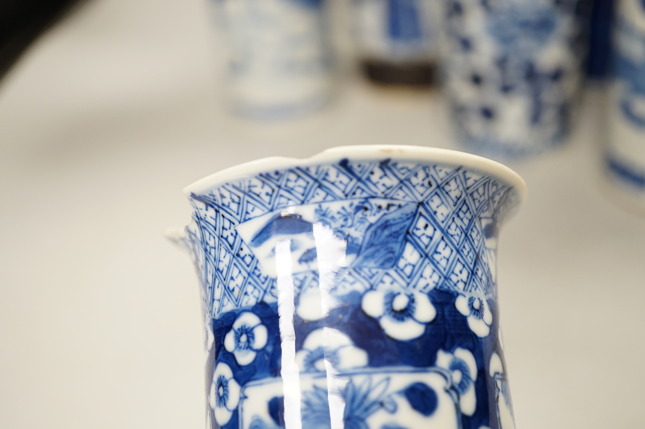 Nine assorted Chinese blue and white cylinder vases, 19th/20th century, tallest 30cm high (a.f.)